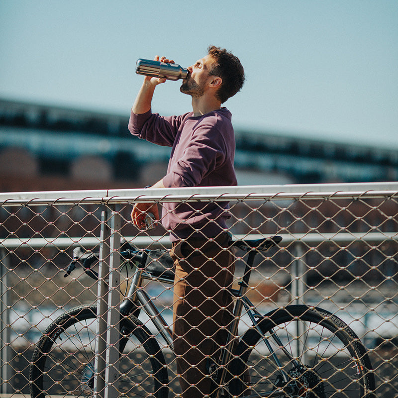 12oz-rise-reflect-with-bamboo-cap-u9 16oz_rise_reflect_man_bike_square.jpg