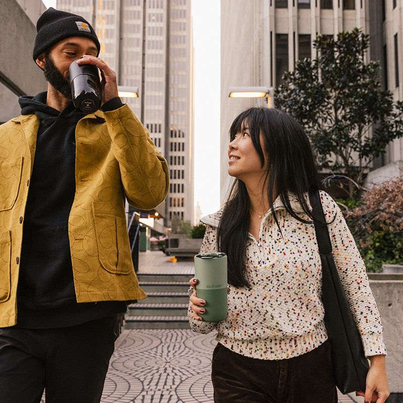 bring-your-own-party-kit-pints-and-tumblers-e1 16oz_rise_tumbler_black_iceberg_couple_drink_city_street_square.jpg