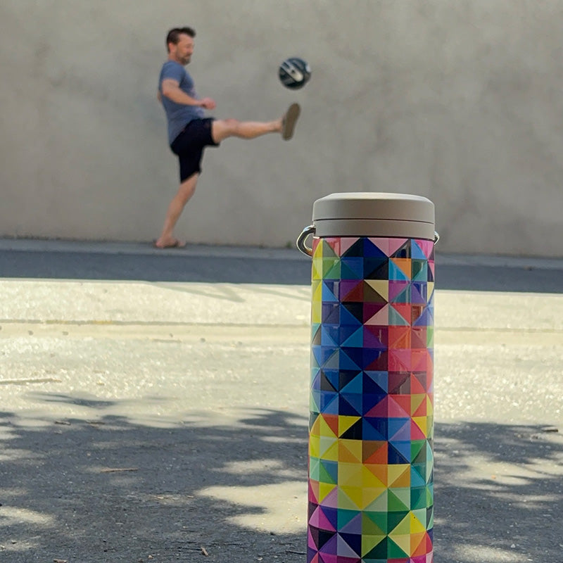 20oz-tkwide-with-twist-cap-mosaic-l1 20oz_tkwide_bottle_seasonal_mosaic_soccerball_player_square.jpg