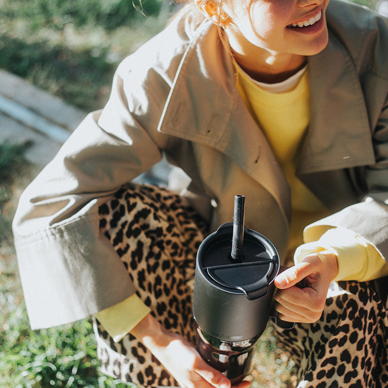 26oz-rise-tumbler-with-straw-lid-y9 26oz_rise_tumbler_black_woman_topview_square.jpg