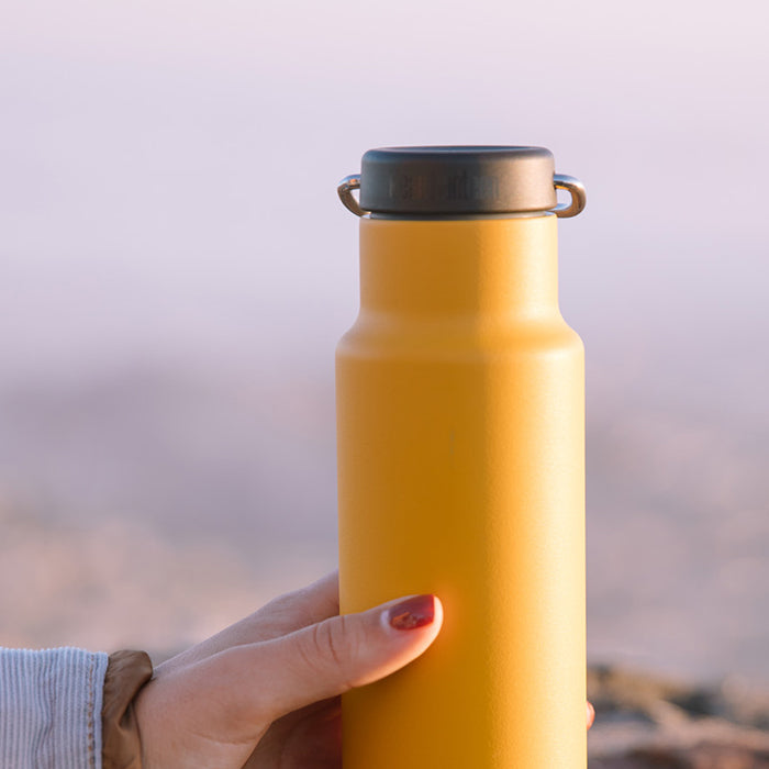 classic-loop-cap-h0 K12VCNPPL-MG-loop-cap_yellow_bottle_lifestyle.jpg