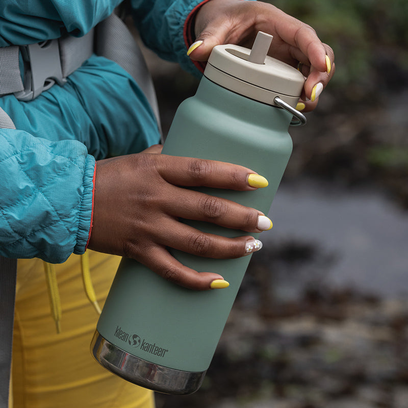 32oz-tkwide-made-to-do-more-bundle-p4 tkwide_32oz_insulated_bottle_twist_closeup_seapsray_hand_square.jpg