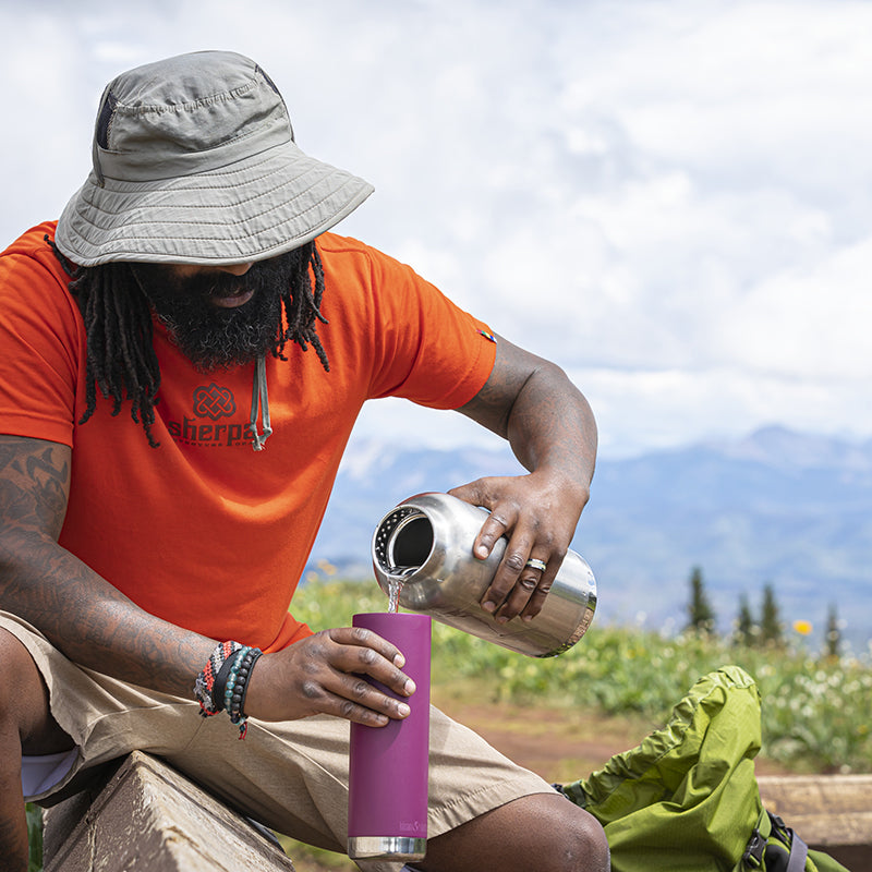 64oz-tkwide-with-loop-cap-l7 tkwide_64oz_bottle_backpacker_mountains_filling_square.jpg