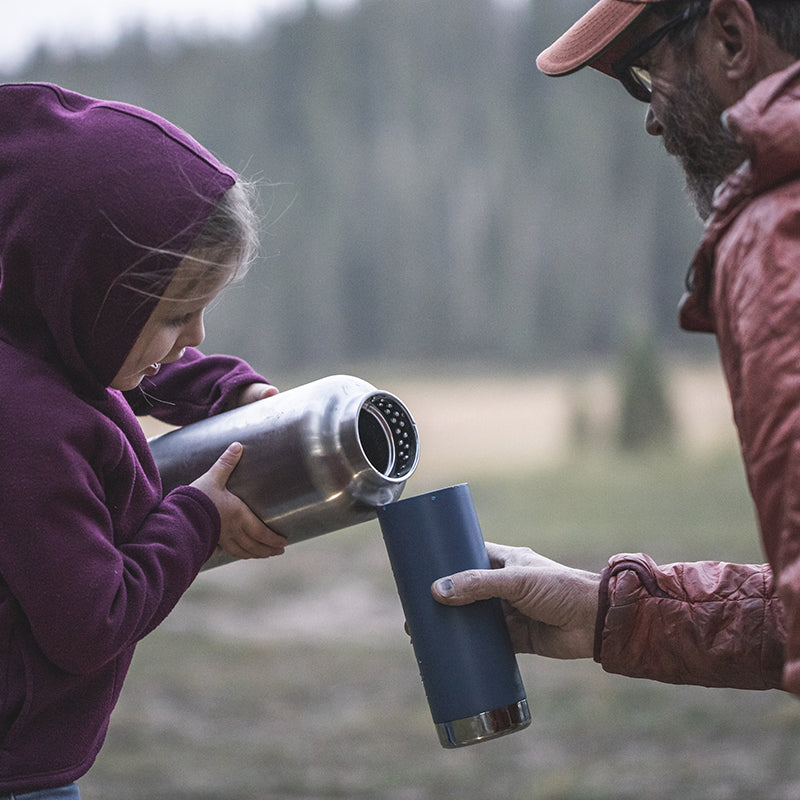 64oz-tkwide-with-loop-cap-l7 tkwide_64oz_bottle_girl_dad_filling_square.jpg